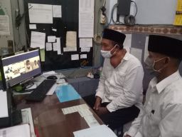 Kedua terdakwa saat menjalani sidang dari Lapas Pasuruan. (Foto: Moch Rois/jatimnow.com)