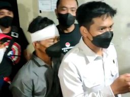 Pelaku pembacokan saat diamankan Satreskrim Polres Kediri (Foto: Andi for jatimnow.com))