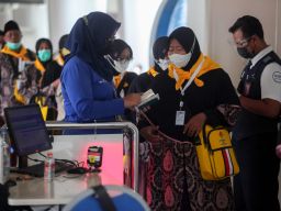 Penerbangan perdana jemaah umrah melalui Bandara Internasional Juanda (Foto-foto: jatimnow.com)