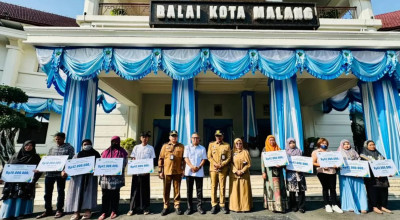 Pedagang hingga Driver Ojol Malang Terima Santunan BPJS Ketenagakerjaan