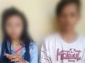 SN (kiri) bersama kekasihnya saat diamankan di Mapolsek Wonocolo Surabaya.