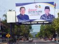 Reklame bergambar Afghani dan SBY saat momentum HUT PGRI dan Hari Guru Nasional 2019