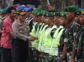 Kapolres Blitar Kota AKBP Adewira Negara Siregar melakukan inspeksi pasukan, Jumat (21/09/2018)