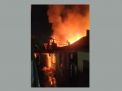 Rumah yang terbakar di Surabaya