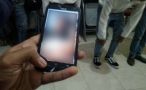 Petugas Satpol PP menemukan video porno pada ponsel salah satu pelajar yang terjaring razia karena bolos sekolah