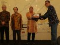 Wali Kota Risma saat membuka acara IAI di Surabaya