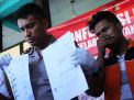 Tersangka pemerkosa dua calon model saat berada di Polres Pelabuhan Tanjung Perak Surabaya, Senin (10/9/2018)