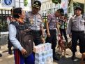 Sidak uang palsu pada jasa penukaran uang di Surabaya