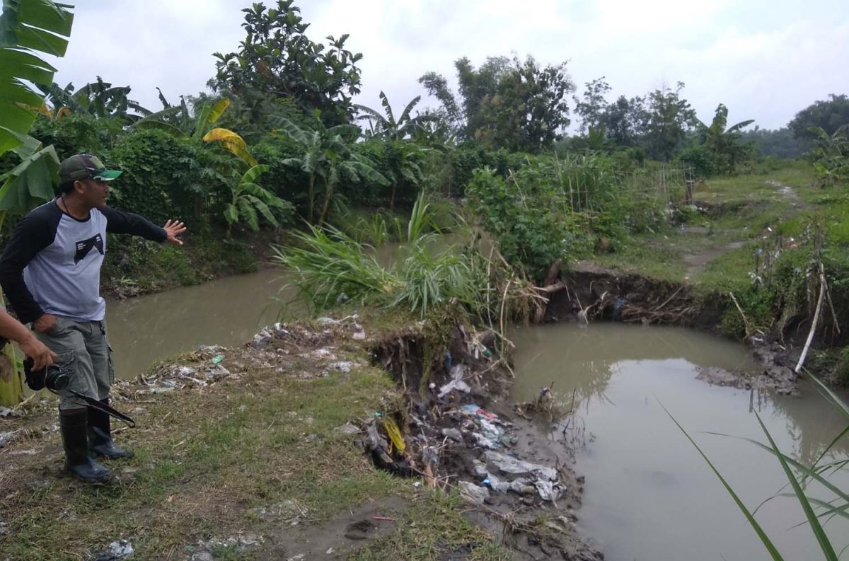 Tanggul Sungai Bancang di Dusun Rejomulyo, Desa Kebonagung, Kecamatan Ploso yang jebol dan memicu terjadinya banjir (Foto: Elok Aprianto/jatimnow.com)