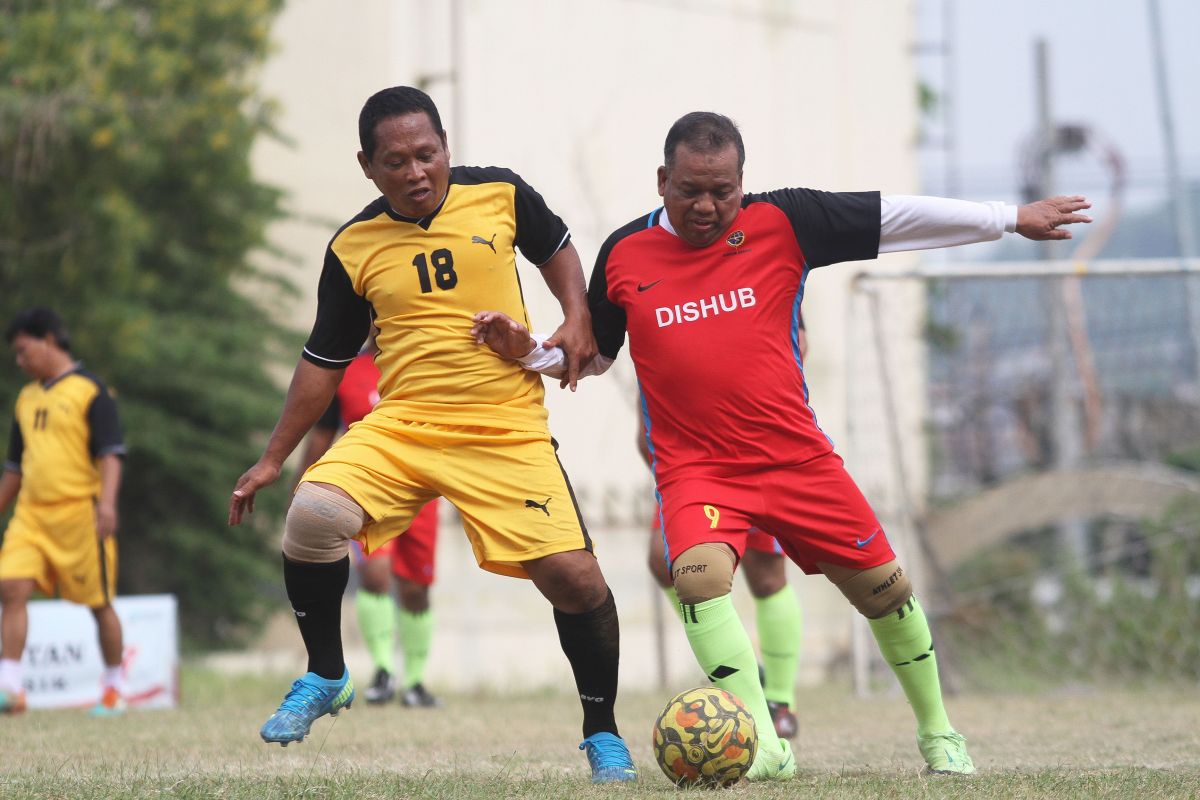 Pertandingan Dishub vs Disparekrafbudpora. (Foto: Sahlul Fahmi/jatimnow.com)