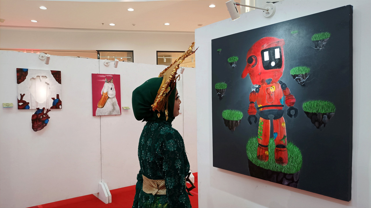 Pameran lukisan karya siswa SMA Muhammadiyah 1 Gresik di acara Srawung Budaya yang digelar Pimpinan Daerah (PD) Muhammadiyah Gresik di Icon Mall. (Foto: Sahlul Fahmi/jatimnow.com)
