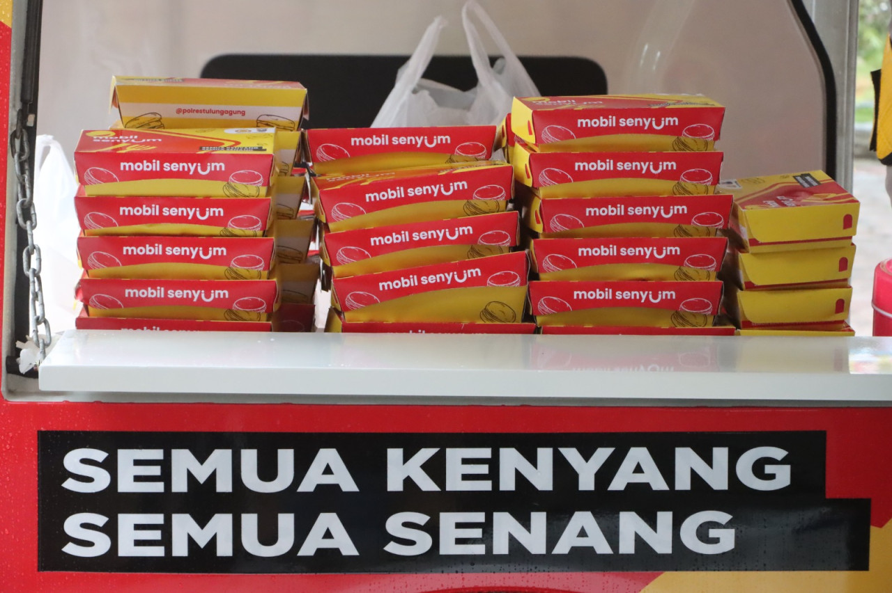 Foto: Slogan program mobil senyum si kuning milik Polres Tulungagung. (Polres Tulungagung/jatimnow.com)