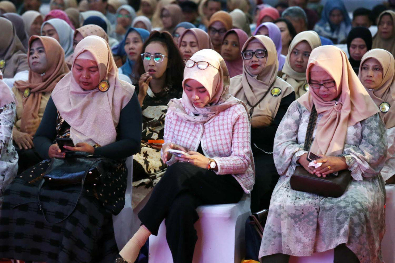  Pelaku UMKM UMKM mengikuti kegiatan AIM ASEAN Roadshow Kota Surabaya yang diselenggarakan di Gedung Jatim Expo pada Kamis (16/4/2026). (Foto: Ali Masduki/jatimnow.com)