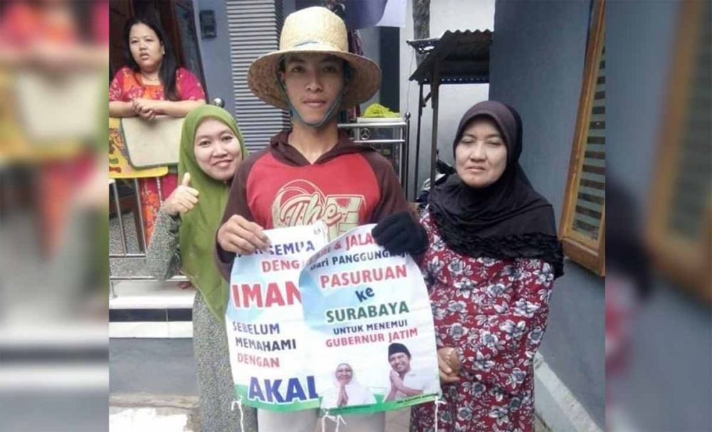 Agus Salim (tengah) joging dari Kota Pasuruan ke Surabaya untuk bertemu Gubernur Khofifah