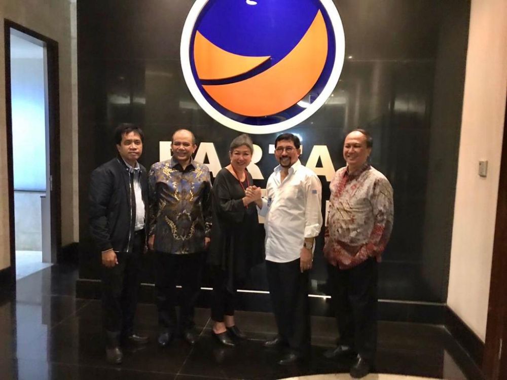 Machfud Arifin bersama pimpinan Partai NasDem di Jakarta