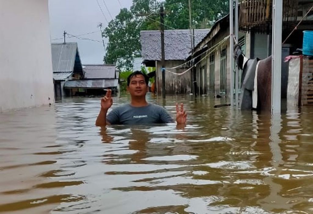 Banjir di Pelaihari, Kabupaten Tanah Laut, Kalimantan Selatan, Sabtu (16/1). 