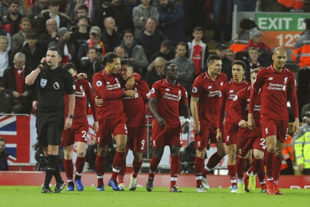 Para pemain Liverpool merayakan kemenangan (Foto: AP Photo/Rui Vieira) 
